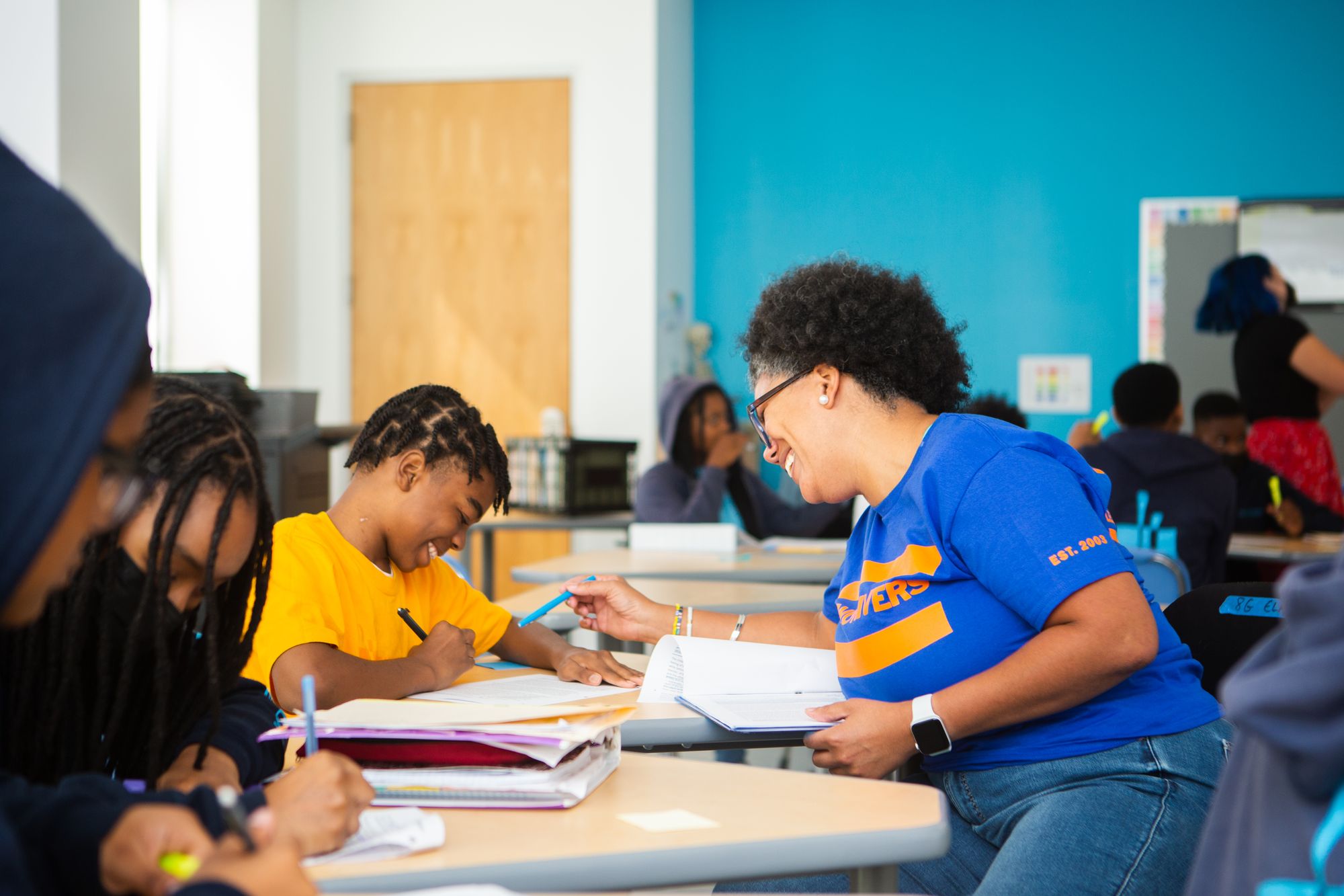 Student and teacher working on a CommonLit lesson. 